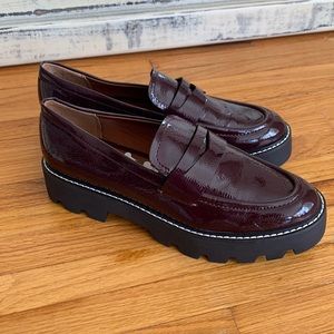 Maroon platform shoes, never worn. Size 8